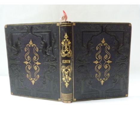 MOORE E. M. &nbsp;Victorian album. Quarto album in dark embossed morocco gilt containing manuscript transcriptions of poetry 
