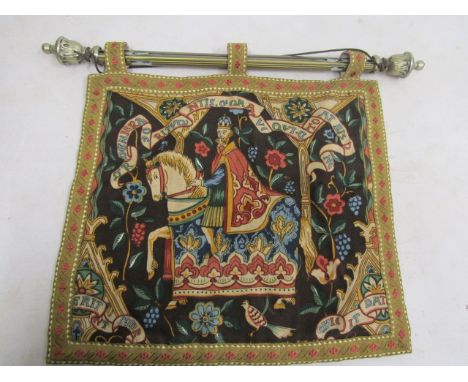 A tapestry displayed on pole 46x43cm