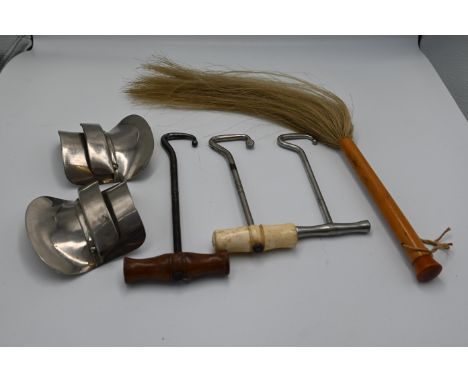 2 vintage bone/wood handle boot pulls plus one other,&nbsp; pair of jockey lifts/slides and horse hair fly whip&nbsp;