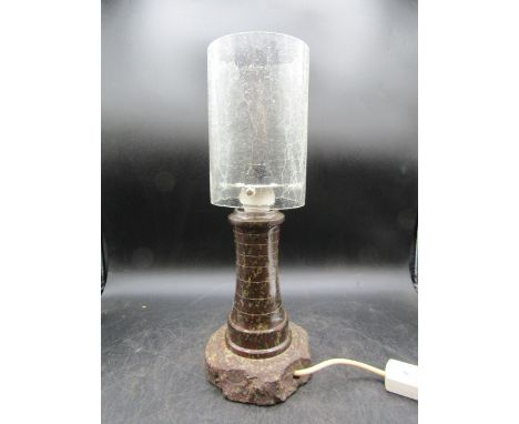 A serpentine rock lighthouse lamp with glass shade (no plug)