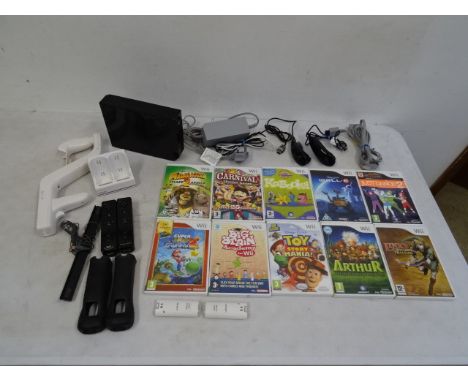 Black Nintendo Wii console with 10 games to include Zelda and Mario etc, all with manuals&nbsp;