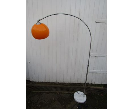 A retro chrome lamp with orange shade (plastic)