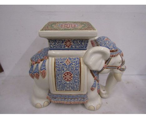 A large ceramic elephant pot stand 45cmH 55cmL