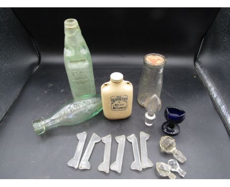vintage bottles, Muff warmer, knife rests, eye wash glass and decanter stoppers&nbsp;