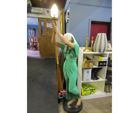 An art deco style Egyptian Lady standing lamp, originally purchased from a cinema and has been re-wired so in working order, 