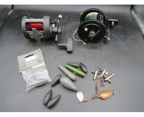 2 fishing reels, weights and lures