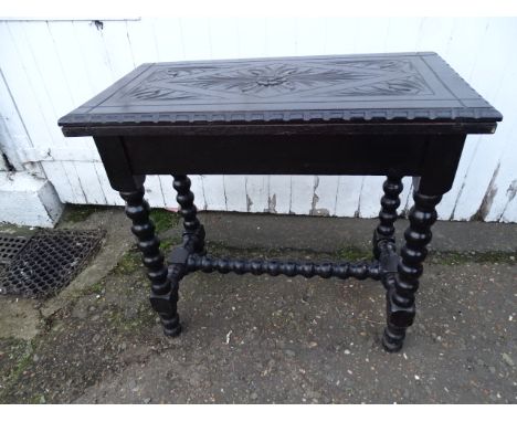 Carved oak folding card/games table with bobbin turned legs and stretcher H70cm W76cm D41cm approx when closed&nbsp;