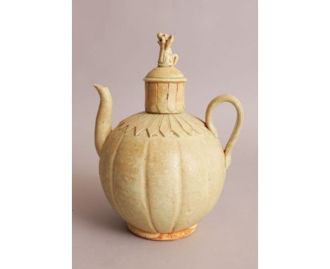 A CHINESE SONG STYLE CELADON GLAZED CERAMIC EWER & COVER, with fluted sides and a mythical animal finial, the base unglazed, 