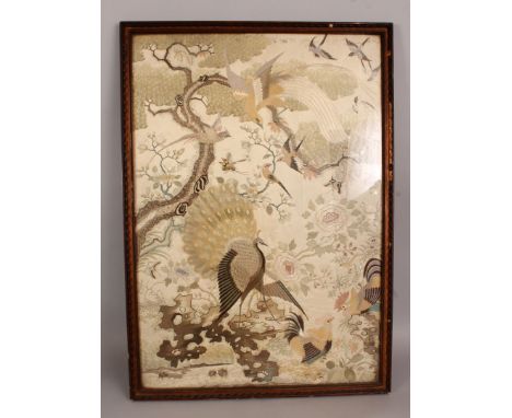 A LARGE FINE QUALITY 19TH/20TH CENTURY FRAMED CHINESE EMBROIDERED PANEL, well decorated with a phoenix above a peacock and ro
