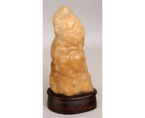AN UNUSUAL 18TH/19TH CENTURY CHINESE STALACTITE SCHOLARS BOULDER, together with a fixed wood stand, 8.1in high overall.
