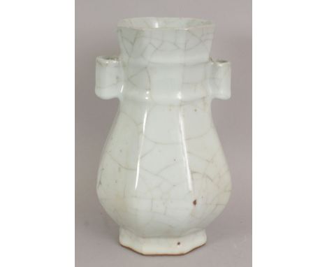 A CHINESE SONG STYLE GUAN TYPE CELADON PORCELAIN ARROW VASE, of octagonal section, 8.4in high.