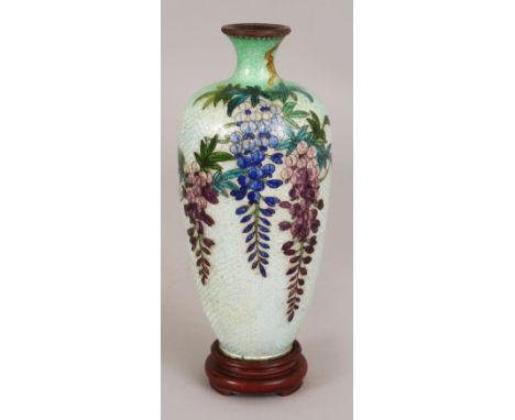 A SIGNED JAPANESE MEIJI PERIOD CLOISONNE GIN BARI VASE, together with a fitted wood stand, the vase decorated with hanging wi