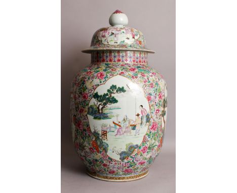 A FINE QUALITY 19TH CENTURY CHINESE FAMILLE ROSE MILLEFLEUR GROUND PORCELAIN VASE & COVER, the sides painted with barbed quat