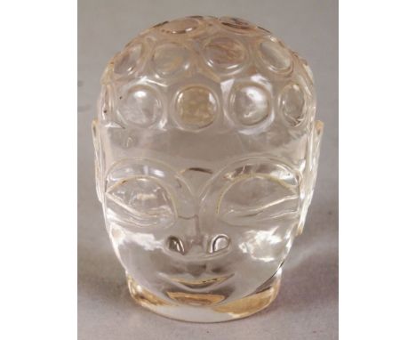 A SMALL SOUTH EAST ASIAN CRYSTAL MODEL OF BUDDHA'S HEAD, 1.75in high.