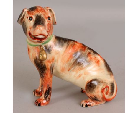 A CHINESE EXPORT PORCELAIN MODEL OF A HOUND, seated on its haunches with half turned head, its fur naturalistically rendered 