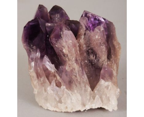A CLUSTER OF NATURAL AMETHYST NODES, 3in wide & 3.4in high.