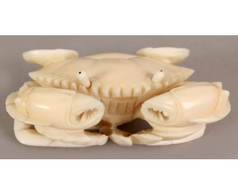 AN EARLY 20TH CENTURY JAPANESE CARVED IVORY MODEL OF A CRAB, 2.5in wide.