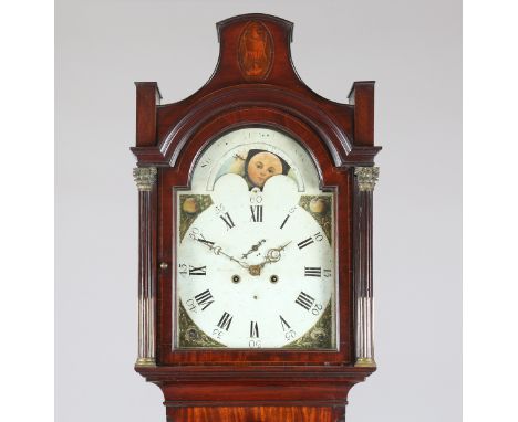 A George III mahogany longcase clock with eight day movement striking on a bell, the 13-inch painted breakarch dial with roll