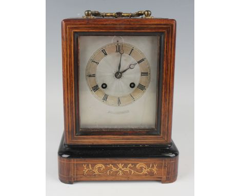 A mid to late 19th century French rosewood carriage style mantel clock, the eight day movement with silk suspension, striking