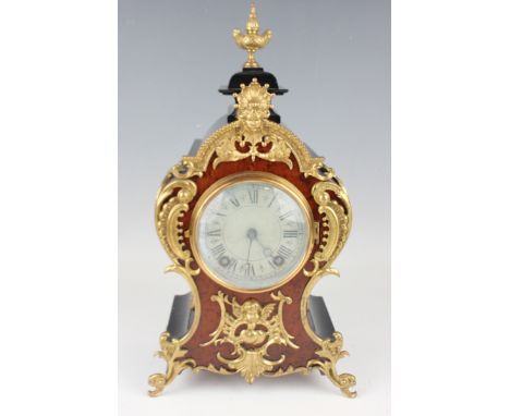 An early 20th century gilt brass mounted burr walnut and ebonized balloon cased mantel clock, with eight day Lenzkirch moveme