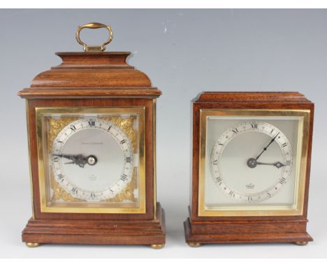 A 20th century mahogany cased mantel timepiece, the square silvered dial detailed 'An Elliott Clock', the case with bell top 