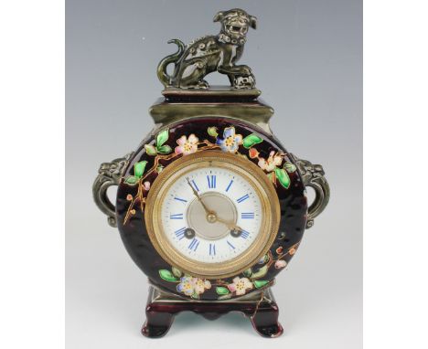 A late 19th century French majolica mantel clock, possibly by Viellard, with eight day movement striking on a bell via an out