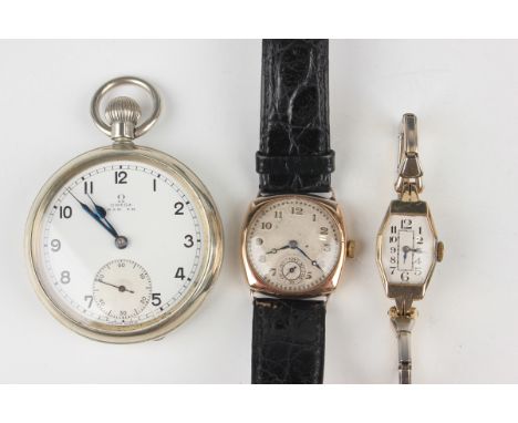 A 9ct gold cushion cased gentleman's wristwatch, the jewelled movement detailed 'Nomide Ligne 101/2', the silvered dial with 