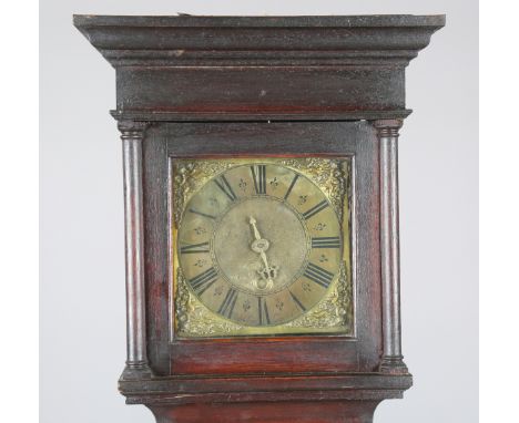 An early 18th century and later oak longcase clock with thirty hour movement striking on a bell via an outside countwheel, th