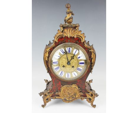 A late 19th century French gilt metal mounted and red tortoiseshell boulle cased mantel clock with eight day movement strikin