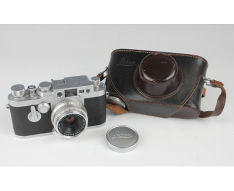 A Leica IIIg camera, Nr. 969 370, circa 1959, with Summaron 1:2.8/35 lens, leather cased.Buyer’s Premium 29.4% (including VAT