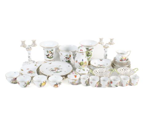 A large collection of Herend ceramics. Including a teapot, pair of candlesticks, plates, teacups and saucers, etc. All glazed