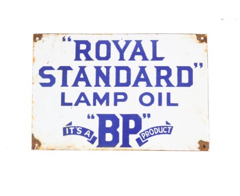 A 20th century enamel Royal Standard Lamp Oil its a "BP" sign. With four drilled holes for wall mounting. H24cm x W36cm