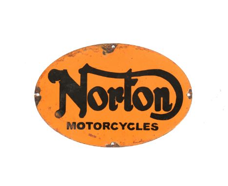 A 20th century Norton motorcycle oval shaped enamel sign. With four drilled holes for wall mounting. H20cm x W30cm.