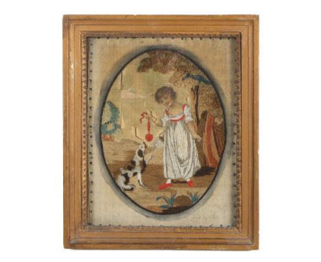 A Georgian silk painted and needlework picture. Depicting a young girl playing with a dog, the girl having painted features, 