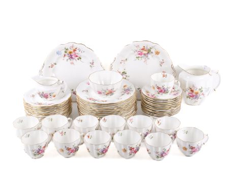A Royal Crown Derby tea service decorated with sprigs of flowers. With gilt rims, comprising twelve small and large plates, t