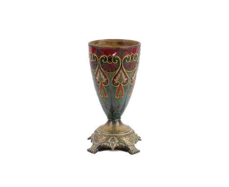 A 20th century ceramic cone-shaped vessel. The cone decorated with a colourful and elaborate pattern, and having a metal inse