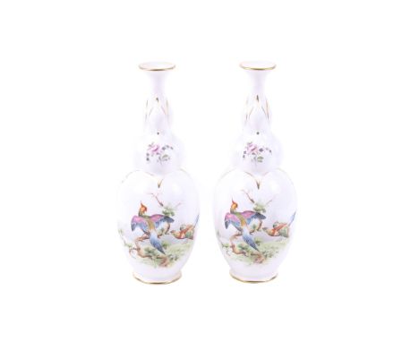 A pair of 1901 Royal Worcester shaped vases decorated with exotic birds. With double garlic shaped neck, decorated and gilt w