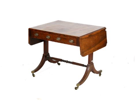A circa 1820 English regency rosewood sofa table. With brass stringing inlay, two drawers to the front with later handles, du