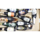 A Good Collection of Commemorative and Vintage Beers and Ales to include Guiness, Skol, Ansells