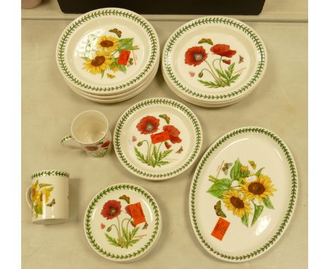 A collection of Portmeirion dinner ware in the poppy and sun flower pattern to include dinner plates , shallow bowls, oval pl