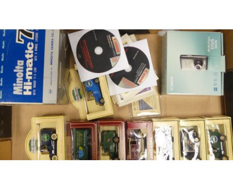 A collection of Days gone boxed toy cars together with Canon digital ixus 100IS camera and Minolta Hi Matic 7's camera ( 1 tr
