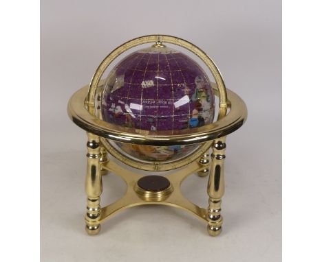 A Mineral Sample Globe on a Polished Brass Coloured Stand. Height: 22cm 