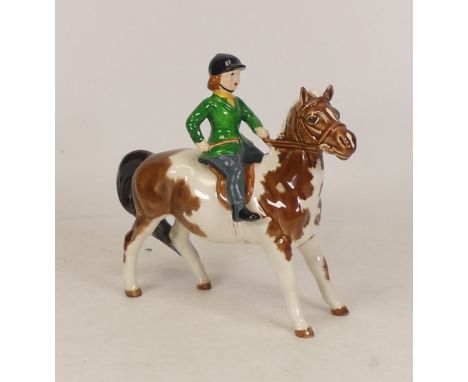 Beswick Girl on Skewbald Pony, model 1499 (rider clothes has been over painted) 