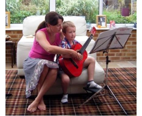 1 whole year of Guitar lessons with the wonderful SA teacher Mrs Dinnigan - Mrs Dinnigan has taught so many of our talented c