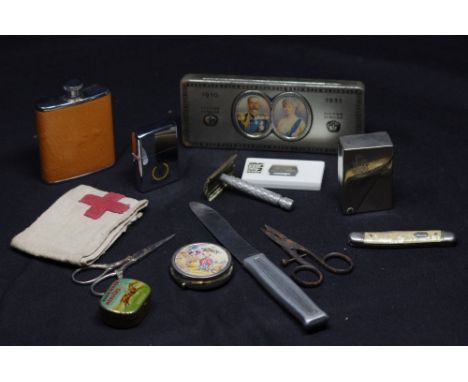 A box of mixed collectables including pocket knives, a WWI Army Medical arm band etc.