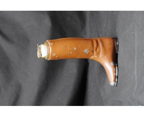 A metal table light in the form of a riding boot, possibly WWI Officer's.