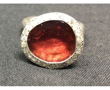 An unusual silver mounted almandine garnet scarf ring, size P/Q.