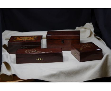 An assortment of lidded boxes including a 19th Century tea caddy.