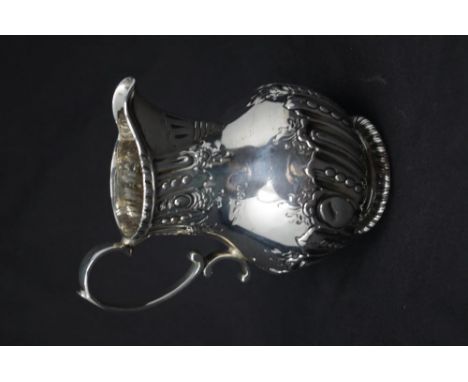 A fine Victorian silver milk/cream jug, maker Army &amp; Navy Cooperative Society Ltd (Frederick Bradford Macrea), London 188