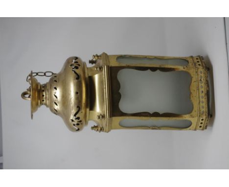 An early 20th Century decorative porch lantern complete with chain and frosted glass panels.